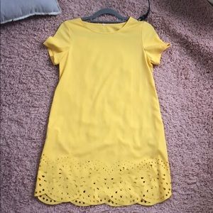 Super cute yellow dress with floral cut outs!
